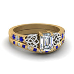 Load image into Gallery viewer, irish-emerald-cut-diamond-bridal-ring-set-with-sapphire-in-yellow-gold-FDENS2255B4EMGSABL-NL-YG_5066df05-7fd0-4e1d-883f-9293cf411117?v=1757052290
