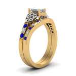 Load image into Gallery viewer, irish-emerald-cut-diamond-bridal-ring-set-with-sapphire-in-yellow-gold-FDENS2255B4EMGSABLANGLE2-NL-YG_7b8a680c-5823-4eed-9bda-c6f3fe89f9d1?v=1757052290
