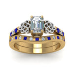 Load image into Gallery viewer, irish-emerald-cut-diamond-bridal-ring-set-with-sapphire-in-yellow-gold-FDENS2255B4EMGSABLANGLE5-NL-YG?v=1757052183
