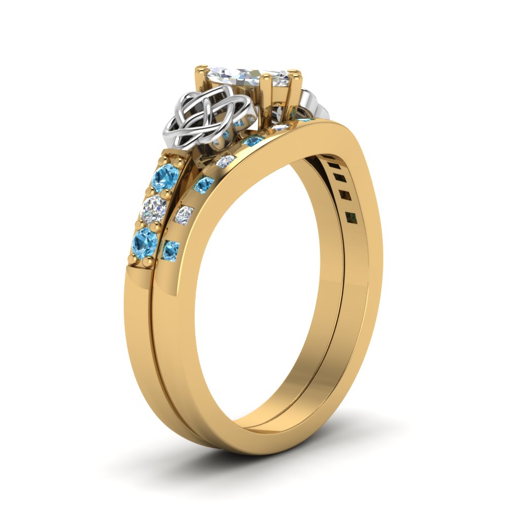 irish-marquise-cut-diamond-bridal-ring-set-with-blue-topaz-in-yellow-gold-FDENS2255B4MQGICBLTOANGLE2-NL-YG_e38ab4a3-4136-40a4-b8ba-00d94e7aad7d?v=1757052307