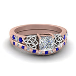Load image into Gallery viewer, irish-princess-cut-diamond-bridal-ring-set-with-sapphire-in-rose-gold-FDENS2255B4PRGSABL-NL-RG_2fa3fcee-09df-48da-9942-ee00cbae2568?v=1757052316
