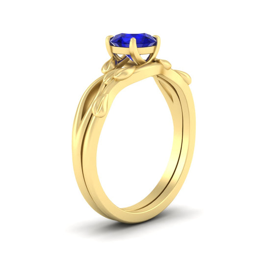 leaf-vine-round-solitaire-sapphire-wedding-ring-set-in-yellow-gold-fdens11688rogsablangle2-nl-yg.jpg?v=1777270309