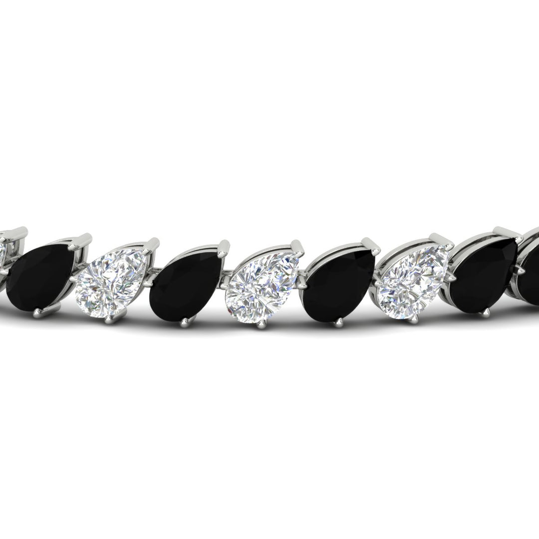 Leaning Pear Cut Diamond Tennis Bracelet