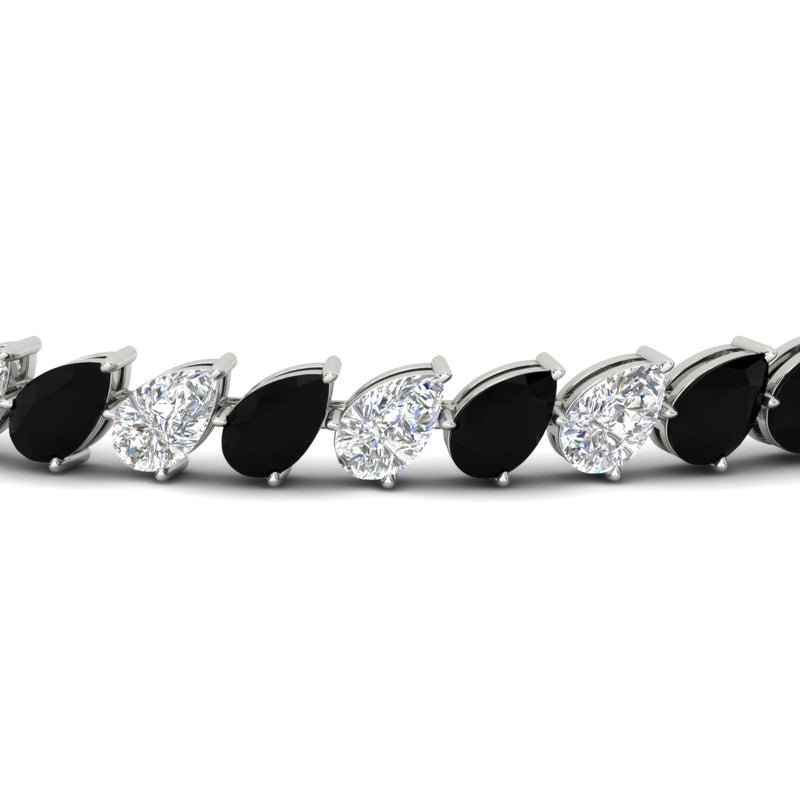 Leaning Pear Cut Diamond Tennis Bracelet