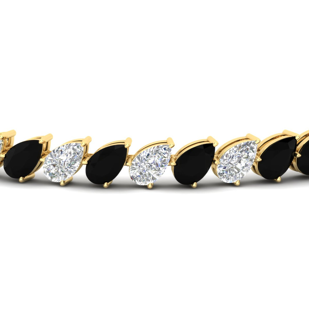 Leaning Pear Cut Diamond Tennis Bracelet