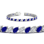 Load image into Gallery viewer, Leaning Pear Cut Diamond Tennis Bracelet
