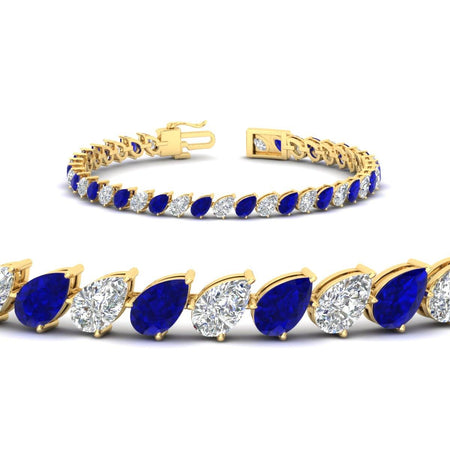 Leaning Pear Cut Diamond Tennis Bracelet