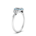 Load image into Gallery viewer, leaves-emerald-cut-halo-diamond-engagement-ring-with-blue-topaz-in-white-gold-FD9827EMRGICBLTOANGLE2-NL-WG.jpg?v=1770891203