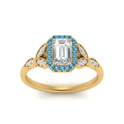 leaves-emerald-cut-halo-diamond-engagement-ring-with-blue-topaz-in-yellow-gold-FD9827EMRGICBLTOANGLE5-NL-YG_3aae6af2-e84b-4e84-8726-9127201f34ed.jpg?v=1770891349