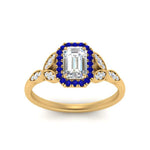Load image into Gallery viewer, leaves-emerald-cut-halo-diamond-engagement-ring-with-sapphire-in-yellow-gold-FD9827EMRGSABLANGLE5-NL-YG.jpg?v=1770891203