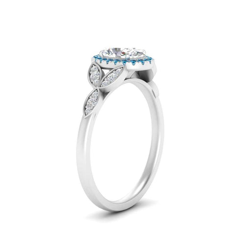 leaves-oval-shaped-halo-diamond-engagement-ring-with-blue-topaz-in-white-gold-FD9827OVRGICBLTOANGLE2-NL-WG_21a3eeda-4fa2-44d2-b8de-1d5a79cfcb4e.jpg?v=1770891378