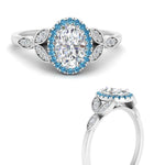 Load image into Gallery viewer, leaves-oval-shaped-halo-diamond-engagement-ring-with-blue-topaz-in-white-gold-FD9827OVRGICBLTOANGLE3-NL-WG.jpg?v=1770891253