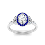 Load image into Gallery viewer, leaves-oval-shaped-halo-diamond-engagement-ring-with-sapphire-in-white-gold-FD9827OVRGSABLANGLE5-NL-WG.jpg?v=1770891254