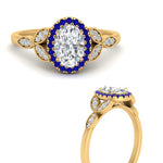 Load image into Gallery viewer, leaves-oval-shaped-halo-diamond-engagement-ring-with-sapphire-in-yellow-gold-FD9827OVRGSABLANGLE3-NL-YG.jpg?v=1770891254