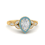 Load image into Gallery viewer, leaves-pear-shaped-halo-diamond-engagement-ring-with-blue-topaz-in-yellow-gold-FD9827PERGICBLTO-NL-YG.jpg?v=1770891269