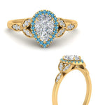 Load image into Gallery viewer, leaves-pear-shaped-halo-diamond-engagement-ring-with-blue-topaz-in-yellow-gold-FD9827PERGICBLTOANGLE3-NL-YG.jpg?v=1770891269