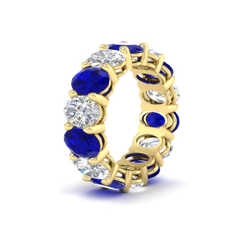 luxury-10-ct-oval-diamond-eternity-wedding-ring-with-blue-sapphire-in-yellow-gold-fdewb8324ovgsablangle2-7.00x5.00mm-nl-yg