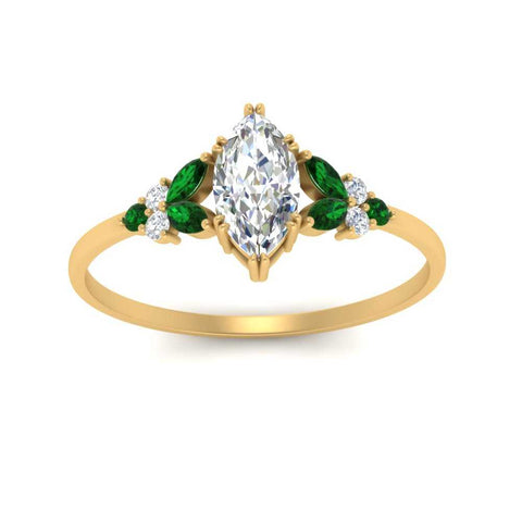 marquise-accented-emerald-marquise-cut-engagement-ring-in-yellow-gold-FD9933MQRGEMGRANGLE5-NL-YG_b0ba51c6-cab3-40cc-9168-b389851a1590.jpg?v=1769496585