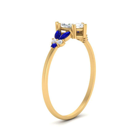 marquise-accented-sapphire-marquise-cut-engagement-ring-in-yellow-gold-FD9933MQRGSABLANGLE2-NL-YG.jpg?v=1769496490