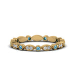 Load image into Gallery viewer, marquise-and-dot-stacked-wedding-band-ring-with-blue-topaz-in-yellow-gold-FD8641BGICBLTO-NL-YG.jpg
