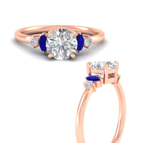marquise-and-round-accented-sapphire-engagement-ring-in-rose-gold-fdenr11621rogsablangle3-nl-rg.jpg?v=1766474255