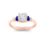Load image into Gallery viewer, marquise-and-round-accented-sapphire-engagement-ring-in-rose-gold-fdenr11621rogsablangle5-nl-rg_18239944-2900-4f39-a652-32c17fe309c5.jpg?v=1764757354

