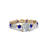 Load image into Gallery viewer, marquise-and-round-eternity-cushion-cut-diamond-engagement-ring-with-sapphire-in-yellow-gold-FDEWB9398CURGSABL-NL-YG_ed8bf829-ebfb-42e5-a891-b5da2d93bf4f.jpg?v=1756456630
