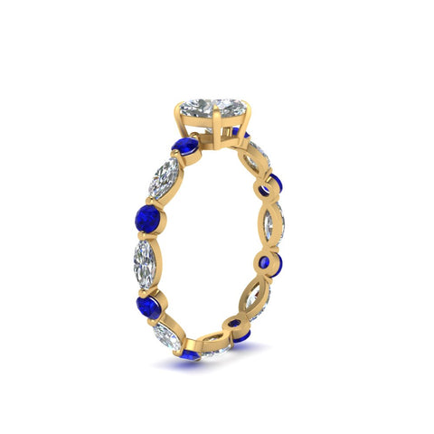 marquise-and-round-eternity-cushion-cut-diamond-engagement-ring-with-sapphire-in-yellow-gold-FDEWB9398CURGSABLANGLE2-NL-YG_3ea492e1-e84f-48e5-983a-bbbd803c7ac0.jpg?v=1756456629