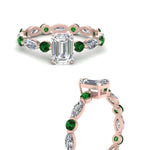 Load image into Gallery viewer, marquise-and-round-eternity-emerald-cut-diamond-engagement-ring-with-emerald-in-rose-gold-FDEWB9398EMRGEMGRANGLE3-NL-RG.jpg?v=1756456495
