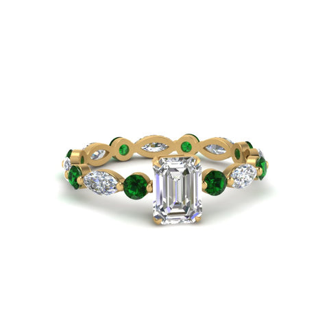 marquise-and-round-eternity-emerald-cut-diamond-engagement-ring-with-emerald-in-yellow-gold-FDEWB9398EMRGEMGR-NL-YG.jpg?v=1756456495