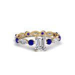Load image into Gallery viewer, marquise-and-round-eternity-emerald-cut-diamond-engagement-ring-with-sapphire-in-yellow-gold-FDEWB9398EMRGSABL-NL-YG_a631774e-5bd9-4afb-873f-f6c8b72fa721.jpg?v=1756456642
