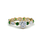 Load image into Gallery viewer, marquise-and-round-eternity-heart-shaped-diamond-engagement-ring-with-emerald-in-yellow-gold-FDEWB9398HTRGEMGR-NL-YG.jpg?v=1756456508
