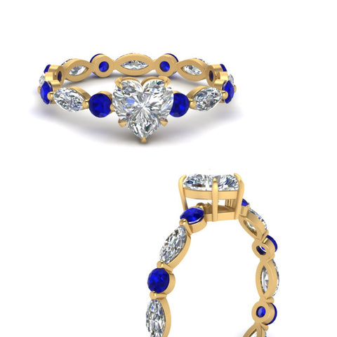marquise-and-round-eternity-heart-shaped-diamond-engagement-ring-with-sapphire-in-yellow-gold-FDEWB9398HTRGSABLANGLE3-NL-YG.jpg?v=1756456509