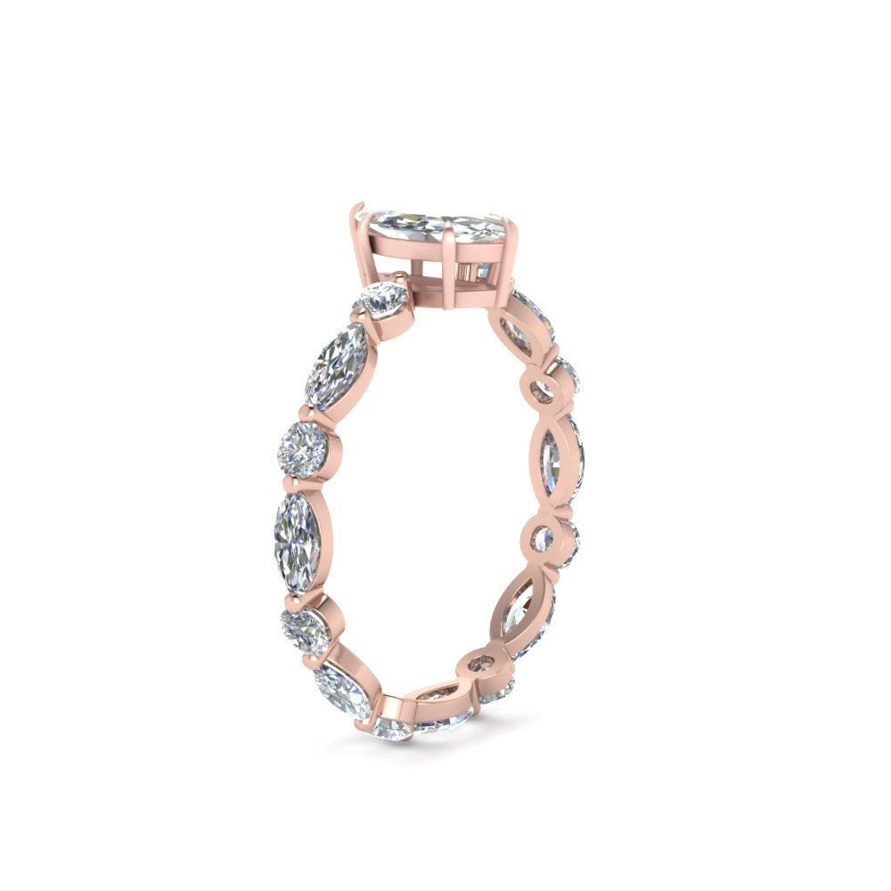 marquise-and-round-eternity-marquise-cut-diamond-engagement-ring-in-rose-gold-FDEWB9398MQRANGLE2-NL-RG.jpg?v=1756456524