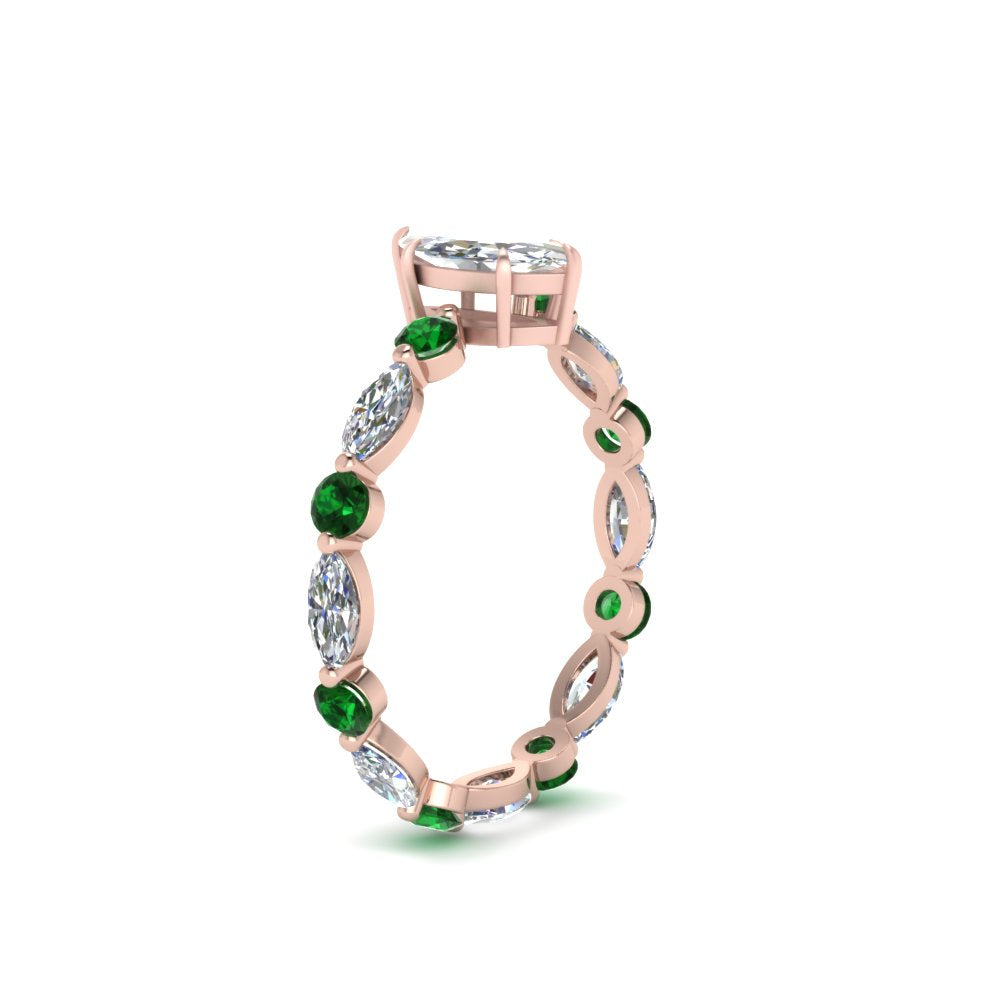 marquise-and-round-eternity-marquise-cut-diamond-engagement-ring-with-emerald-in-rose-gold-FDEWB9398MQRGEMGRANGLE2-NL-RG.jpg?v=1756456524