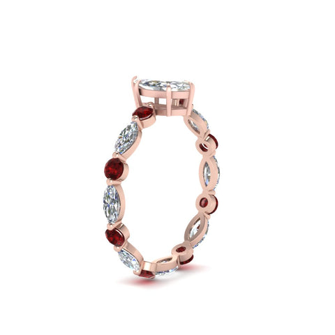 marquise-and-round-eternity-marquise-cut-diamond-engagement-ring-with-ruby-in-rose-gold-FDEWB9398MQRGRUDRANGLE2-NL-RG.jpg?v=1756456525