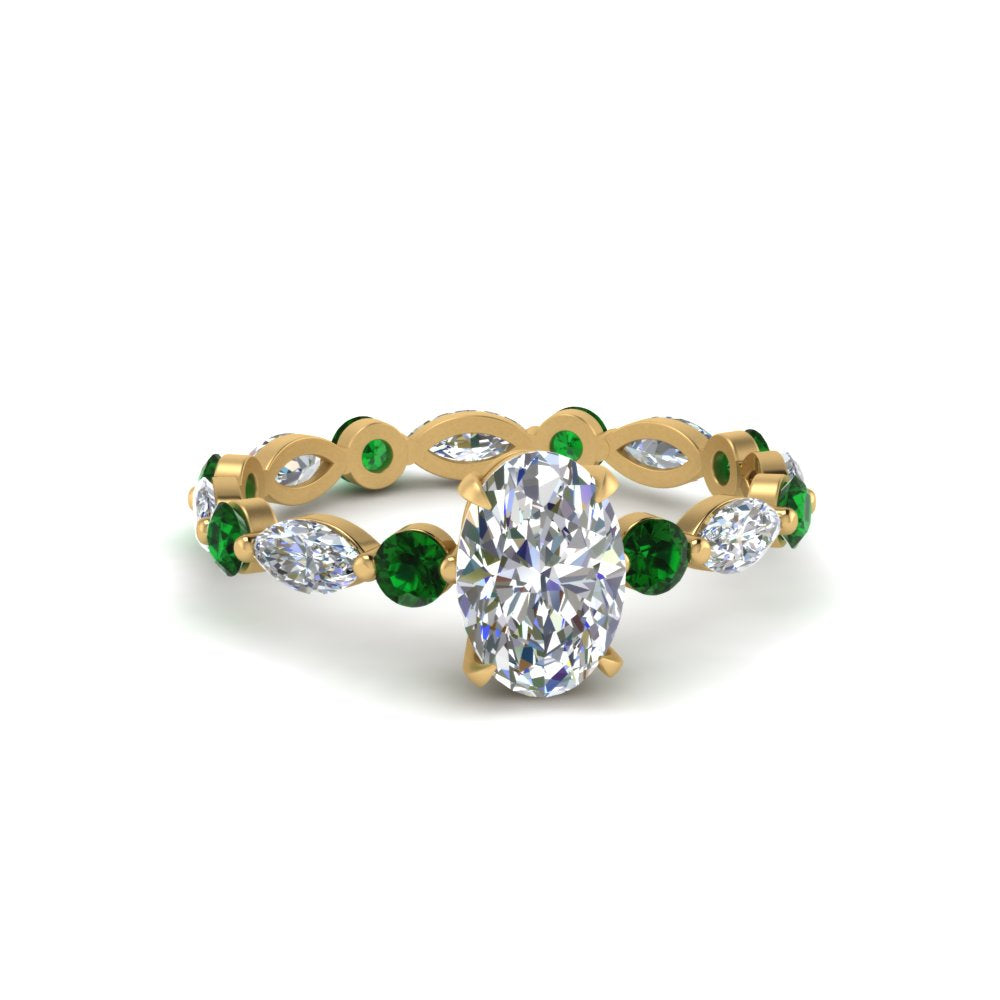 marquise-and-round-eternity-oval-shaped-diamond-engagement-ring-with-emerald-in-yellow-gold-FDEWB9398OVRGEMGR-NL-YG.jpg?v=1756456540
