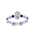 Load image into Gallery viewer, marquise-and-round-eternity-oval-shaped-diamond-engagement-ring-with-sapphire-in-white-gold-FDEWB9398OVRGSABLANGLE5-NL-WG.jpg?v=1756456540
