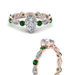 Load image into Gallery viewer, marquise-and-round-eternity-pear-shaped-diamond-engagement-ring-with-emerald-in-rose-gold-FDEWB9398PERGEMGRANGLE3-NL-RG_70d41215-bdf4-4334-bd4e-7e82b635e368.jpg?v=1756456683
