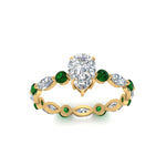 Load image into Gallery viewer, marquise-and-round-eternity-pear-shaped-diamond-engagement-ring-with-emerald-in-yellow-gold-FDEWB9398PERGEMGRANGLE5-NL-YG_b948ae11-0ee3-4bb8-bb34-e37c2fa05fa7.jpg?v=1756456683
