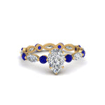 Load image into Gallery viewer, marquise-and-round-eternity-pear-shaped-diamond-engagement-ring-with-sapphire-in-yellow-gold-FDEWB9398PERGSABL-NL-YG_9439d37b-0f01-40bd-942a-3328a8b6e3b7.jpg?v=1756456683
