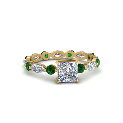 marquise-and-round-eternity-princess-cut-diamond-engagement-ring-with-emerald-in-yellow-gold-FDEWB9398PRRGEMGR-NL-YG.jpg?v=1756456570