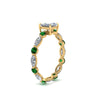 Load image into Gallery viewer, marquise-and-round-eternity-princess-cut-diamond-engagement-ring-with-emerald-in-yellow-gold-FDEWB9398PRRGEMGRANGLE2-NL-YG.jpg?v=1756456570