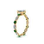 Load image into Gallery viewer, marquise-and-round-eternity-princess-cut-diamond-engagement-ring-with-emerald-in-yellow-gold-FDEWB9398PRRGEMGRANGLE2-NL-YG.jpg?v=1756456570
