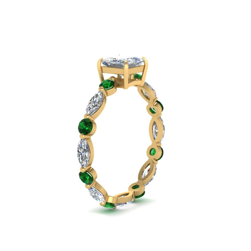 marquise-and-round-eternity-princess-cut-diamond-engagement-ring-with-emerald-in-yellow-gold-FDEWB9398PRRGEMGRANGLE2-NL-YG.jpg?v=1756456570