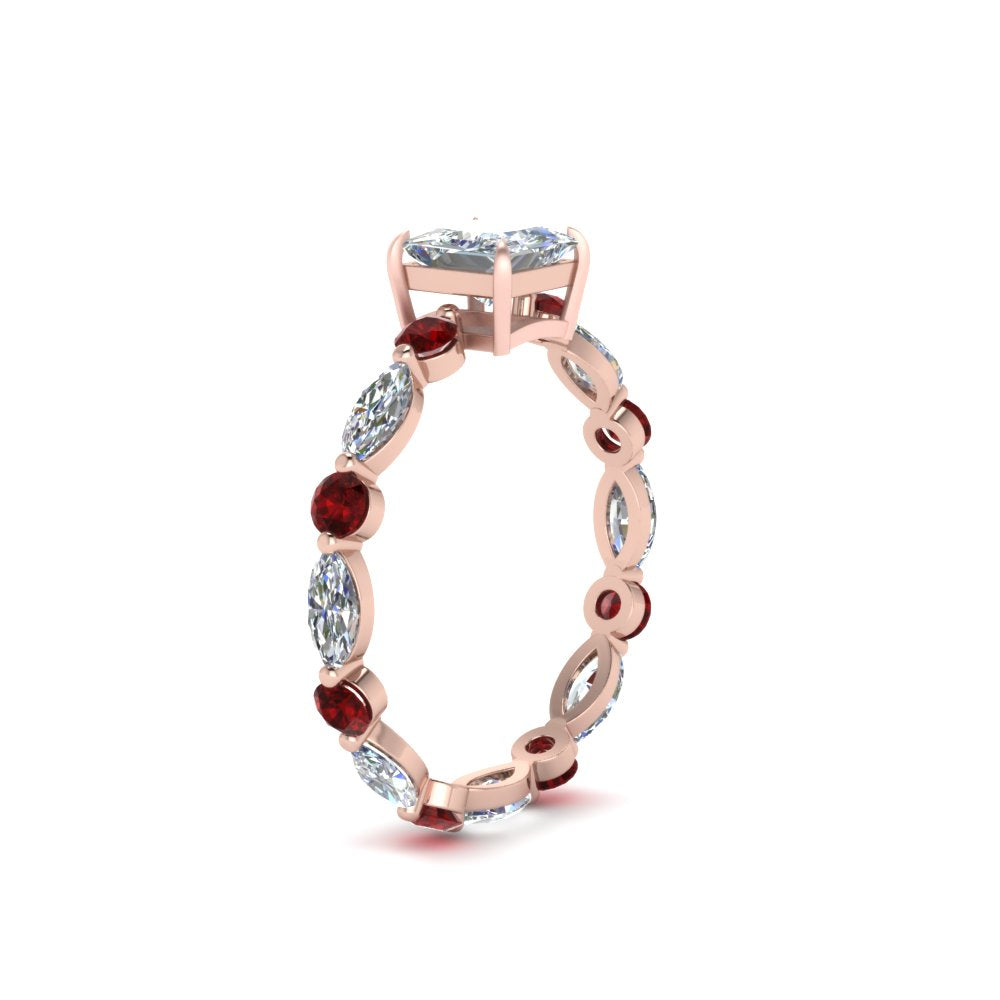 marquise-and-round-eternity-princess-cut-diamond-engagement-ring-with-ruby-in-rose-gold-FDEWB9398PRRGRUDRANGLE2-NL-RG.jpg?v=1756456571