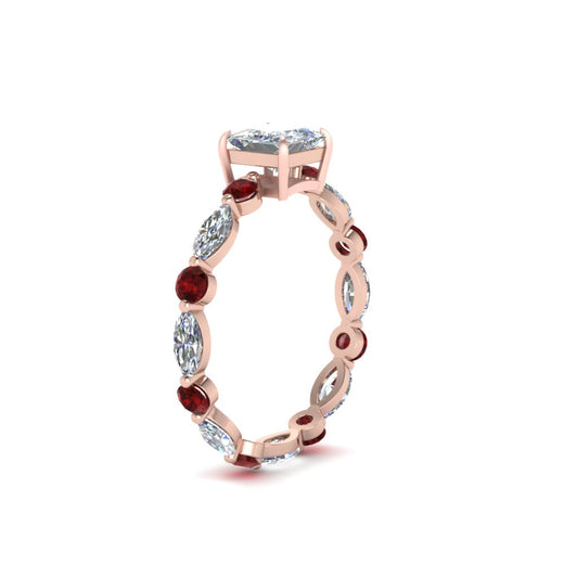 marquise-and-round-eternity-princess-cut-diamond-engagement-ring-with-ruby-in-rose-gold-FDEWB9398PRRGRUDRANGLE2-NL-RG.jpg?v=1756456571