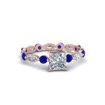 Load image into Gallery viewer, marquise-and-round-eternity-princess-cut-diamond-engagement-ring-with-sapphire-in-rose-gold-FDEWB9398PRRGSABL-NL-RG.jpg?v=1756456570
