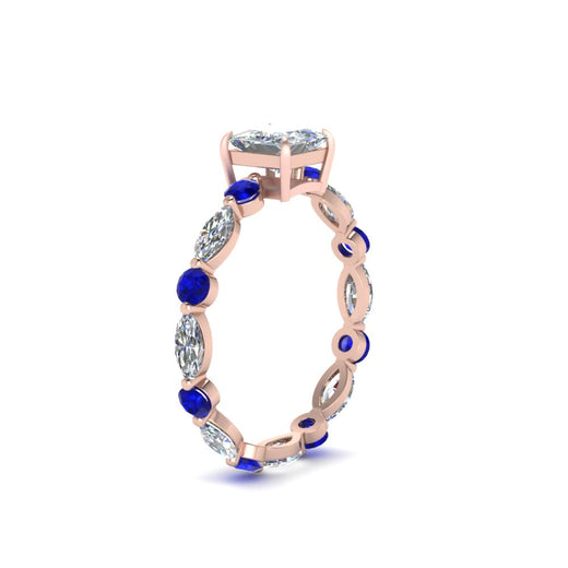 marquise-and-round-eternity-princess-cut-diamond-engagement-ring-with-sapphire-in-rose-gold-FDEWB9398PRRGSABLANGLE2-NL-RG.jpg?v=1756456570