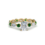 Load image into Gallery viewer, marquise-and-round-eternity-radiant-cut-diamond-engagement-ring-with-emerald-in-yellow-gold-FDEWB9398RARGEMGR-NL-YG_60df1f22-2af8-4899-9059-aa601e0563e2.jpg?v=1756456704
